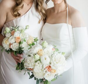 Bridal party holding white bouquets flowers Melbourne outdoor wedding