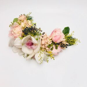Pastel flower shoulder spray arrangement with fresh blooms, designed by Melbourne florist Fayflower for weddings and special occasions