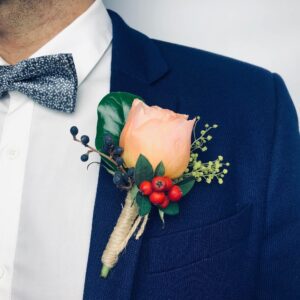 Pink rose buttonhole with fresh flowers, handcrafted by Melbourne florist Fayflower for weddings and formal occasions