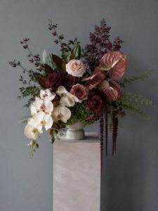 Elegant fresh flower arrangement in a vase with premium seasonal blooms.