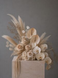 Luxury floral arrangement in a vase with premium blooms and elegant foliage.