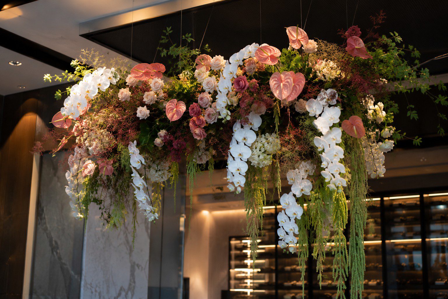 Luxury preserved floral ceiling hanging installation featuring sculptural preserved flowers in a contemporary neutral palette, designed by Fay Flowers Studio in Melbourne.
